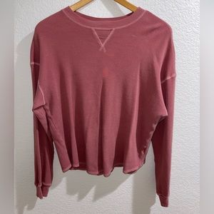 Stretchy material, long sleeve, salmon colored sweater